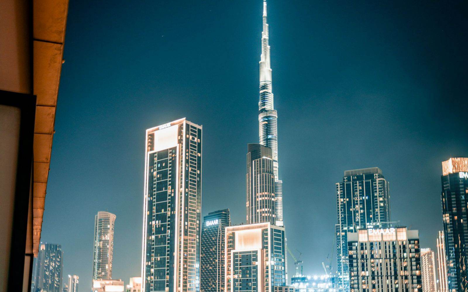 Downtown Dubai at night, towers in deep blue light