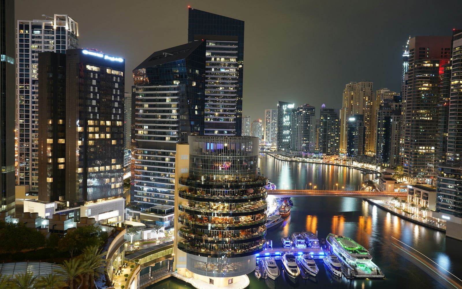 Dubai Marina after dark, waterfront and towers lit up