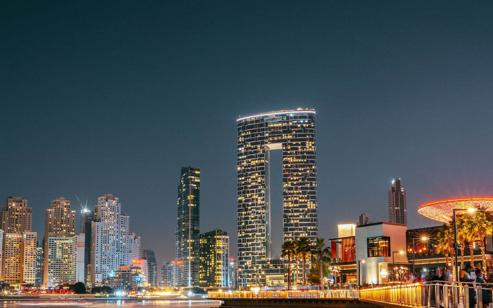 Dubai Marina seen from the water at dusk